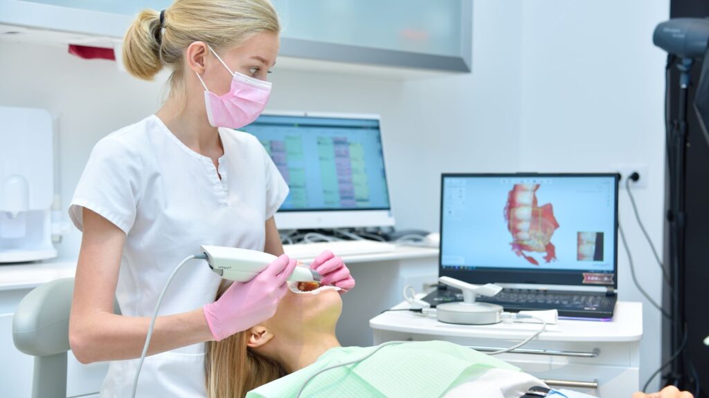 Orthodontist in Windermere performing digital dental scan for patient’s orthodontic treatment