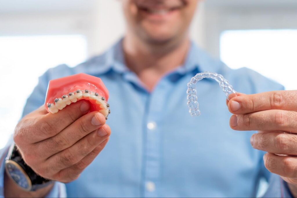 Patient comparing braces and Invisalign