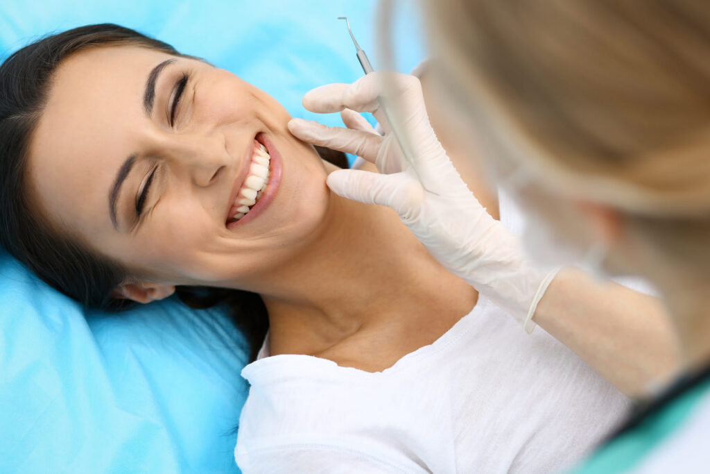 Patient smiling after orthodontic visit