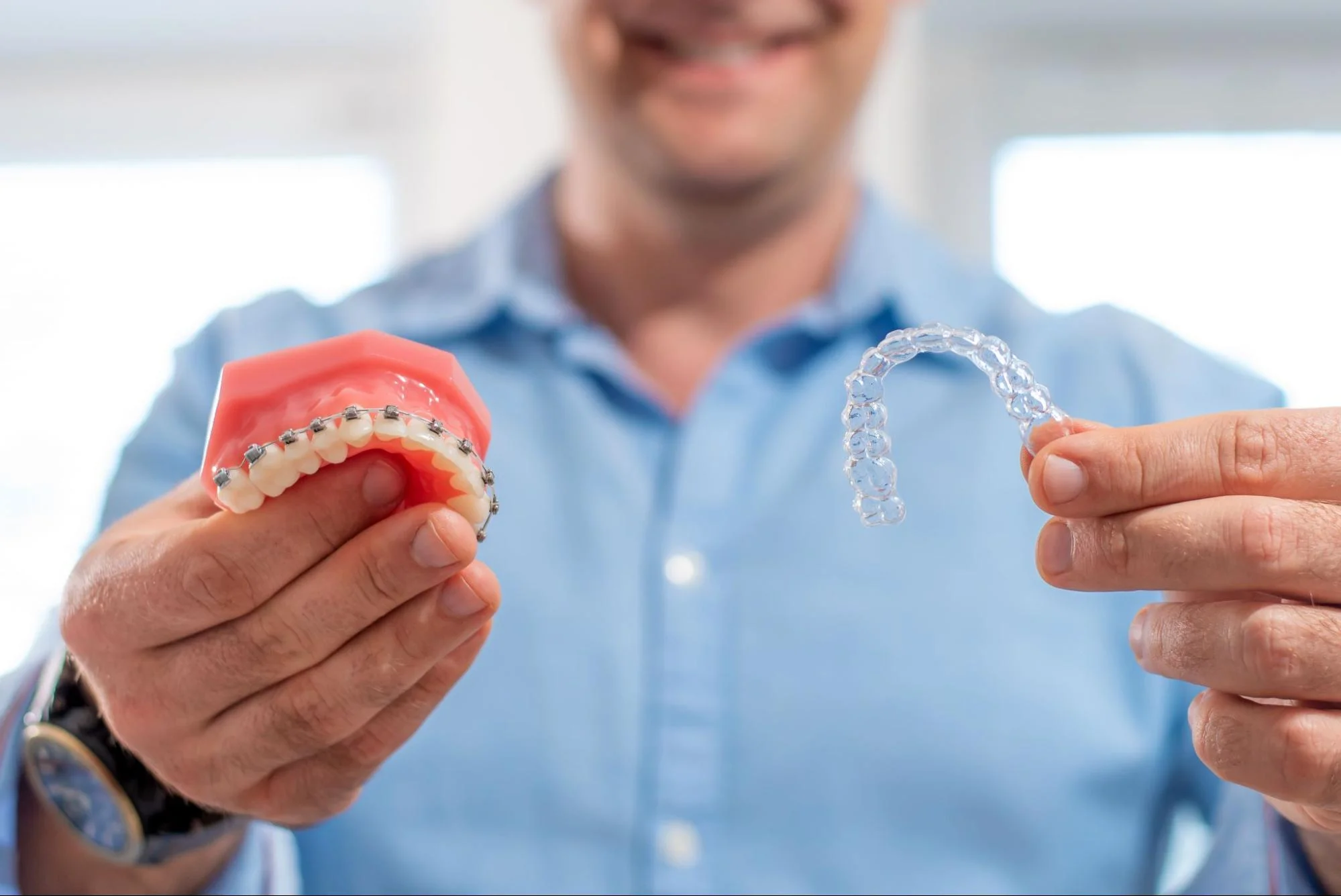 Patient comparing braces and Invisalign
